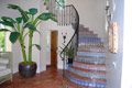 Spiral staircase located in this private intracoastal community home